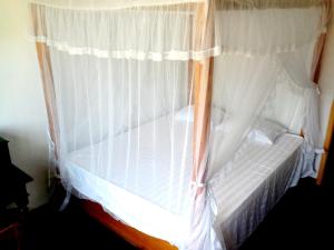 Letto o letti in una camera di Sunstyle Mirissa Guest House