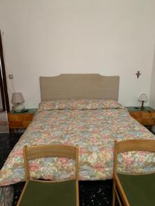 Voodi või voodid majutusasutuse La CocciNella toas