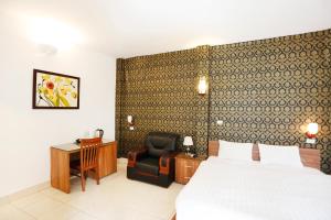 Voodi või voodid majutusasutuse Especen Hotel toas