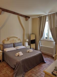Postel nebo postele na pokoji v ubytování Casa Aurora