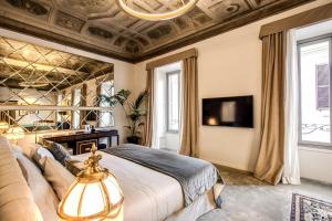 TV a/nebo společenská místnost v ubytování Martius Private Suites Hotel