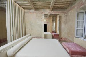 Postel nebo postele na pokoji v ubytování SUGAR ROOMS Residenza d'Epoca