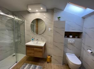 Kúpeľňa v ubytovaní Apartmani Nova + 37 fotografií