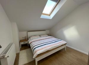 Posteľ alebo postele v izbe v ubytovaní Apartmani Nova