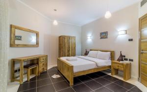 Katil atau katil-katil dalam bilik di Royal Beach Serviced Apartments