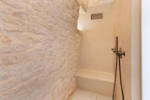 Koupelna v ubytování Suite21 - The Trulli Experience