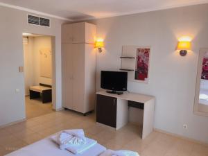 TV a/nebo společenská místnost v ubytování Arapya Resort
