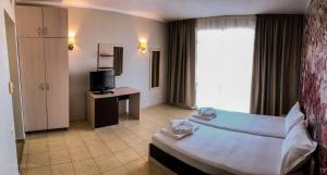 Postel nebo postele na pokoji v ubytování Arapya Resort + 37 fotografií