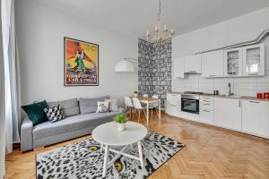 Kuchyňa alebo kuchynka v ubytovaní Atelier Apartment Centrum by Grand Apartments
