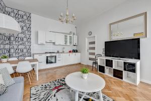 Kuchyňa alebo kuchynka v ubytovaní Atelier Apartment Centrum by Grand Apartments