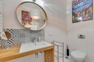 Kúpeľňa v ubytovaní Atelier Apartment Centrum by Grand Apartments + 9 fotografií