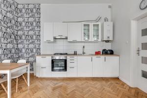 Kuchyňa alebo kuchynka v ubytovaní Atelier Apartment Centrum by Grand Apartments