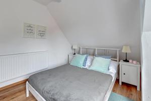 Posteľ alebo postele v izbe v ubytovaní Grand Apartments - Happy Loft Apartment