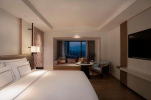 清迈美利亚酒店 (Melia Chiang Mai)客房内的一张或多张床位