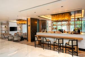 清迈美利亚酒店 (Melia Chiang Mai)的电视和/或娱乐中心