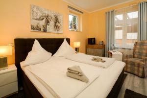 Postel nebo postele na pokoji v ubytování Hotel Zur Mühle