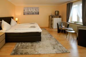 Postel nebo postele na pokoji v ubytování Hotel Zur Mühle