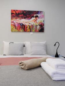 Giường trong phòng chung tại Erinaki Apartments