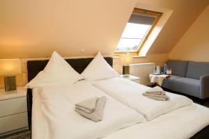 Postel nebo postele na pokoji v ubytování Hotel Zur Mühle