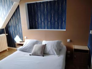 Postel nebo postele na pokoji v ubytování Hotel Central Anzac