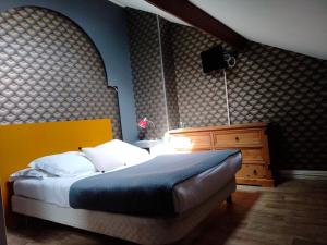 Postel nebo postele na pokoji v ubytování Hotel Central Anzac