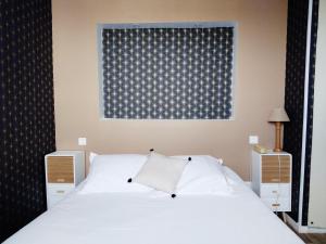 Postel nebo postele na pokoji v ubytování Hotel Central Anzac