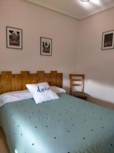 Postel nebo postele na pokoji v ubytování La Casa del Limonero
