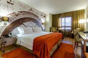 Postel nebo postele na pokoji v ubytování Hotel Marques De Pombal + 37 fotografií