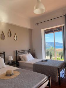 Ένα ή περισσότερα κρεβάτια σε δωμάτιο στο Ilias Apartments Dassia By Hotelius