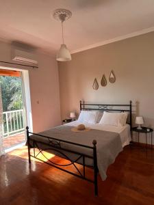 Ένα ή περισσότερα κρεβάτια σε δωμάτιο στο Ilias Apartments Dassia By Hotelius