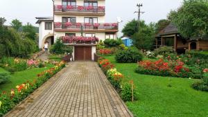 Κήπος έξω από το Apartament Frezja