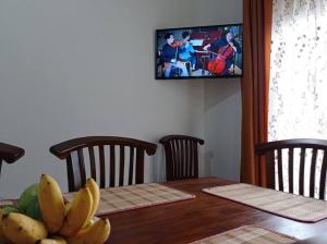 TV a/nebo společenská místnost v ubytování Saubagya Residence - Air Port View