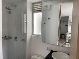 Koupelna v ubytování Hermoso conjunto residencial con piscina!