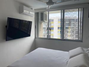 TV a/nebo společenská místnost v ubytování Hermoso conjunto residencial con piscina!