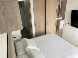 Postel nebo postele na pokoji v ubytování Hermoso conjunto residencial con piscina!