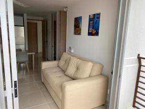Posezení v ubytování Hermoso conjunto residencial con piscina!