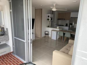 Kuchyň nebo kuchyňský kout v ubytování Hermoso conjunto residencial con piscina!