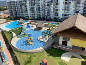 Bazén v ubytování Hermoso conjunto residencial con piscina! nebo v jeho okolí