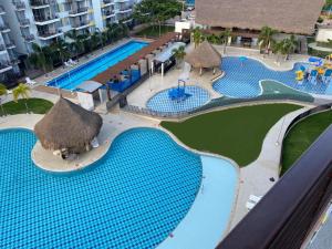 Bazén v ubytování Hermoso conjunto residencial con piscina! nebo v jeho okolí