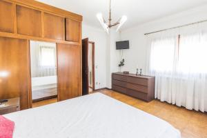 Postel nebo postele na pokoji v ubytování Casa da Cabreira - Uma vista fantástica