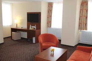Posezení v ubytování Stadt-gut-Hotel Gasthof Goldener Adler