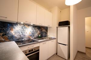 Kuchyňa alebo kuchynka v ubytovaní Apartament Charlie