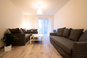 Posedenie v ubytovaní Apartament Charlie
