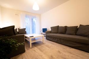 Posedenie v ubytovaní Apartament Charlie