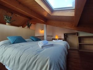 A bed or beds in a room at Allotjaments Paratge Fabas