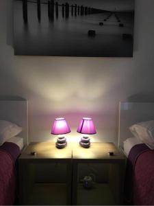 Posteľ alebo postele v izbe v ubytovaní Momentum Apartment