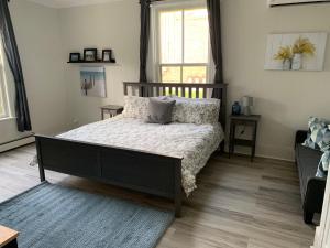Llit o llits en una habitació de County Cove - Picton Suite