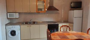 Kuchyň nebo kuchyňský kout v ubytování Centro Torla 4pax Apartamento