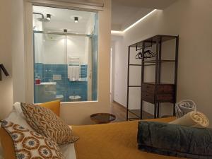 Un pat sau paturi într-o cameră la Al Porto 61 - Rooms for Rent