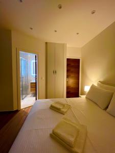 מיטה או מיטות בחדר ב-Vila Zrina - Apartmani